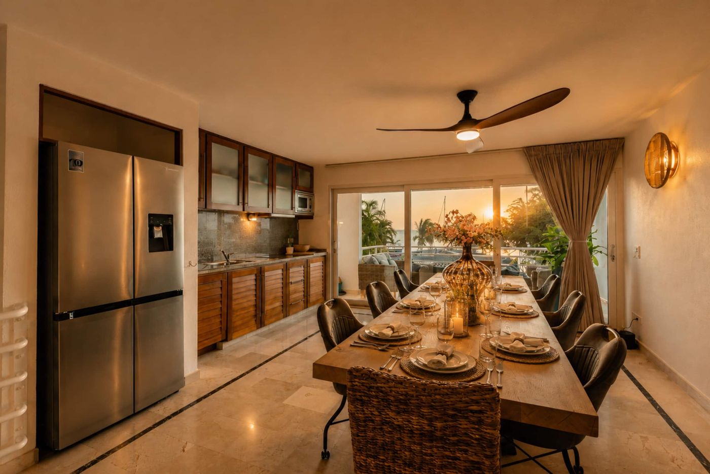 Large designer dining table and modern kitchen