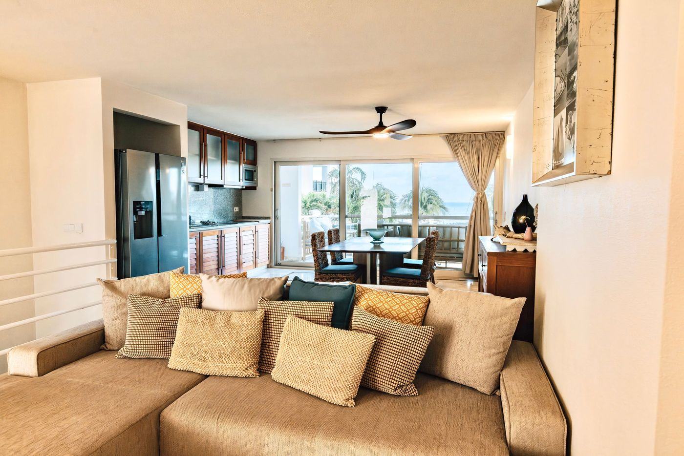 Living room with sofa and view to the sea